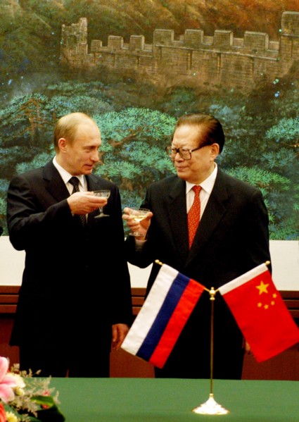 Beijing, china, december 2 2002: president of russia vladimir putin (left) and chairman of the people's republic of china jiang zemin(right) toast after the talks at the national congress centre, mond...