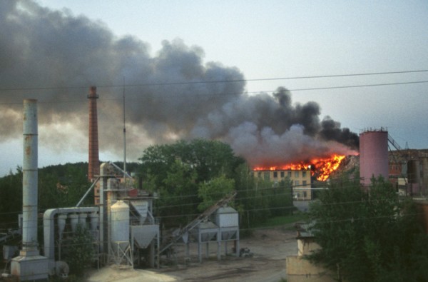 Moscow region, russia, smoke of a burning dump at the asphalt plant in domodedovo, yesterday cloaked the whole town, the ecological situation in moscow suburbs keeps deteriorating, 08,2003.
