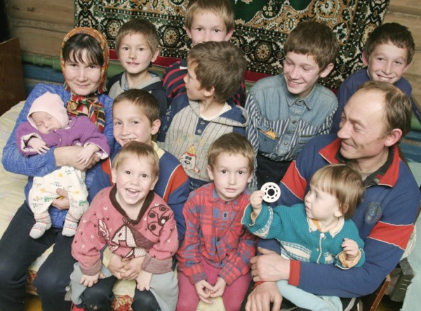 Chuvashia, siberia, russia, october 25 2003, chuvash family living in poverty, mother valentina pours soup for father leonid and their children, there are ten boys in the family, the elder is 13 years...