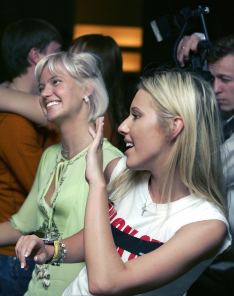 Pop singer natasha ionova aka glyukoza (l) and kseniya sobchak, the wealthy daughter of anatoly sobchak, a leading democratic reformer in the late-1980s, smile during the durak card game tournament at...