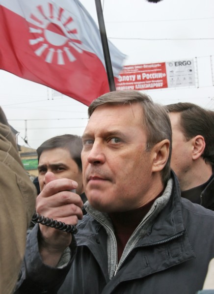Leader of the russian people's democratic union mikhail kasyanov speaks into a megaphone at an opposition rally “the march of those who disagree” in support of the yabloko party, march 4,2007, moscow,...