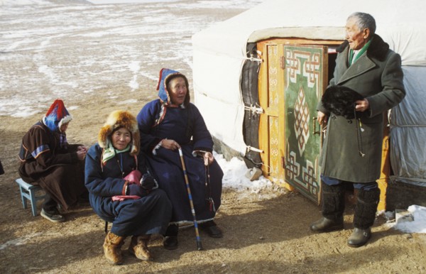 Elderly buryat people outside of their yurt in the village of urdaga in the aginsk buryat autonomous republic, siberia, russia.