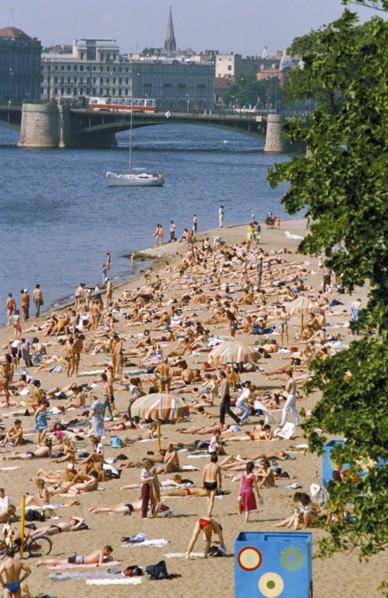Bathers on a beach on the neva river in st, petersburg, 1990s.