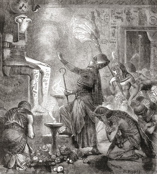 An Egyptian king worshipping the God Horus in a temple