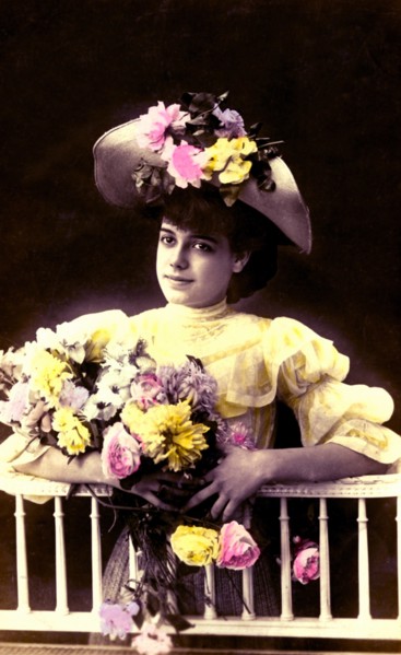 Nice girl with flowers bouquet