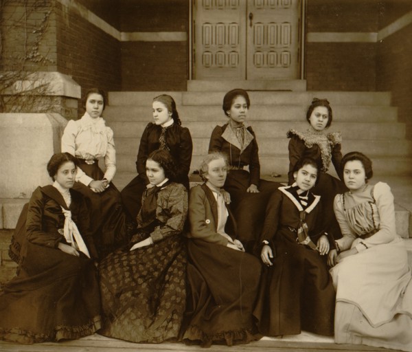 Nine African American women, full-length portrait, seated on steps of a building at Atlanta University, Georgia