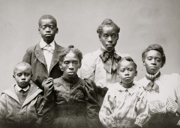 Mrs. Frazer Baker and children, family of the murdered postmaster