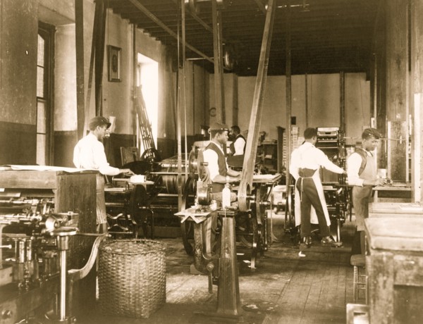 Pressmen at work in printing shop, Hampton Institute