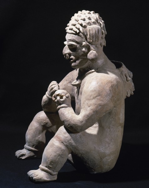 Seated man.
