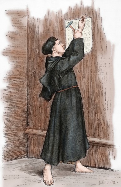 Martin Luther (1483-1546) hanging his 95 theses in Wittenberg, 1517. Engraving. Colored.