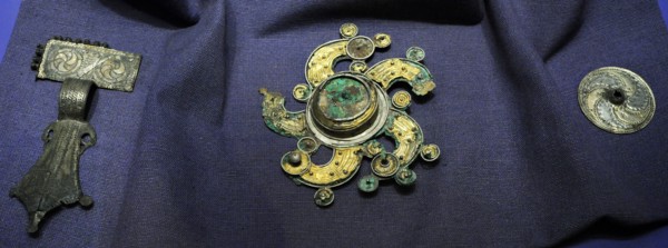 Solar cross brooch.