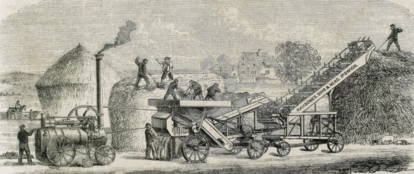 Threshing machine with steam. Industrial Revolution. Engraving. 19th c.