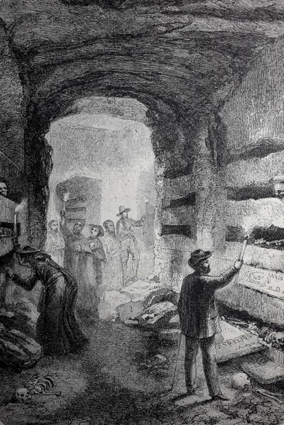 Visitors in the catacombs of Rome