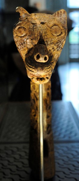 Animal-head post carved in wood