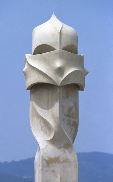 Chimney shaped like a warrior. Roof terrace.