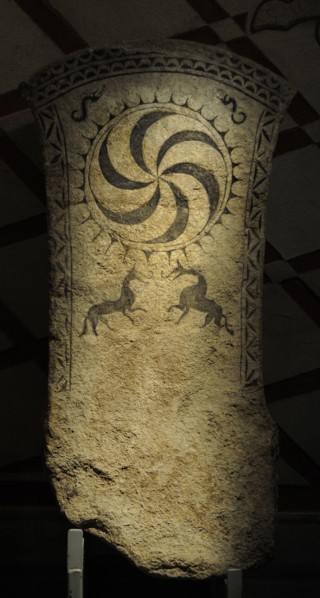 Petroglyph with whorl in the center.