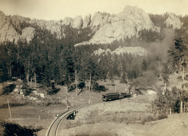 Horse Shoe Curve.' On B[urlington] and M[issouri River] R'y. Buckhorn Mountains in background 1891.