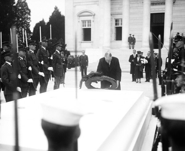 Herbert Hoover placing wreath at Tomb of Unknown Soldier, Arlington National Cemetery circa 1931.