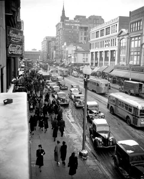 Cars, buses and pedestrians in Washington D.C. street scene circa January 1939 (P Street) .