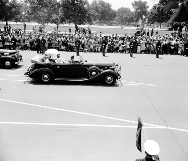 King and Queen of England (Great Britain) in an automobile visiting Washington D.C. circa 1938 or 1939 .