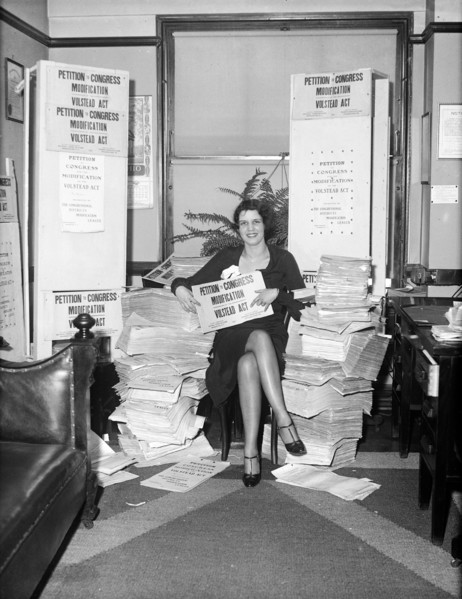 Woman with signs: Petition to Congress Modification, Volstead Act circa 1932.