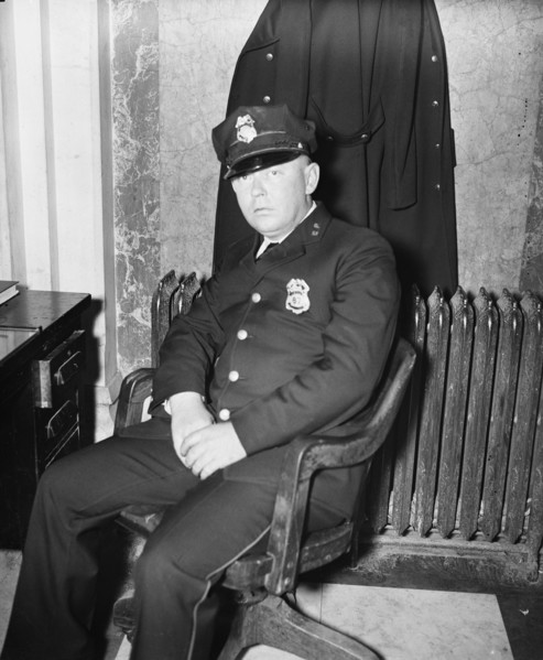 Fred. C. Parker, alleged life threatener of Sen. Huey Long, as he appeared at his post of duty in the House office building where he works as a member of the Capitol police force circa February 8, 193...