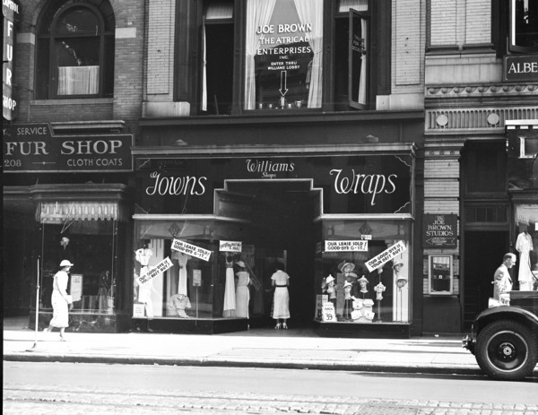 Washington D.C. History - View of businesses: Joe Brown Theatrical Enterprises and Williams Shops, Gowns, Wraps circa 1935 .