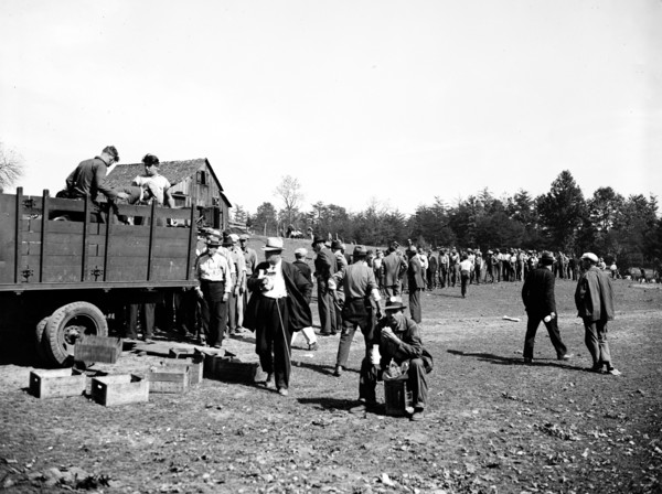 Workers at Tugwelltown (Greenbelt Maryland) take a lunch break circa October 1935.