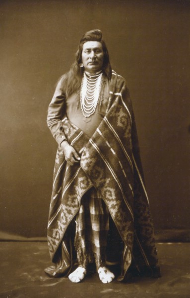 Edward S. Curtis Native American Indians - Full-length portrait of a Nez Percé man circa 1899.
