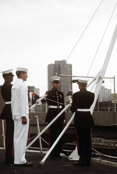 Raising the colors aboard the USS IWO JIMA