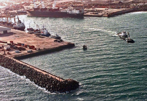 1992 - Aerial view of the Port of Mogadishu.  Three cargo ships