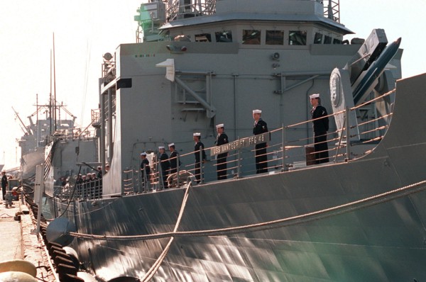 Navy sailors man the rail