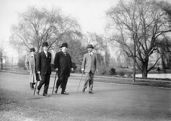 President William Howard Taft walking with Archibald Butt and Charles Dewey Hilles