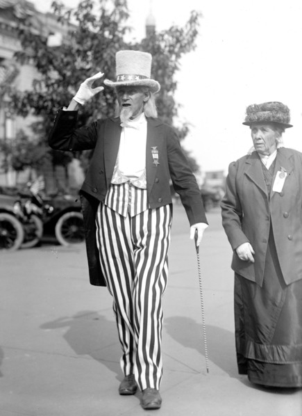 Man dressed as Uncle Sam at a parade in 1916.