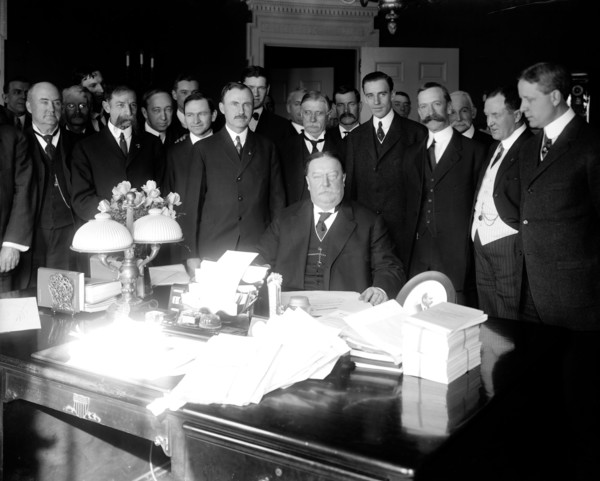 President William Howard Taft signing Arizona statehood bill.
