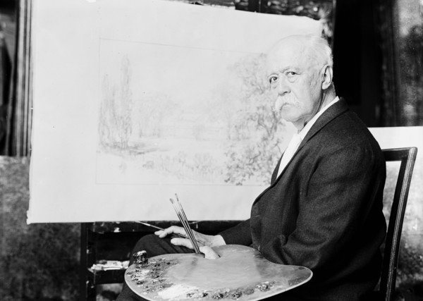 Artist John Ross Key in a studio painting
