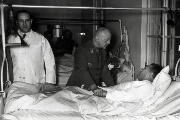 Wounded soldier in hospital after failed assasination attempt on Adolf Hilter