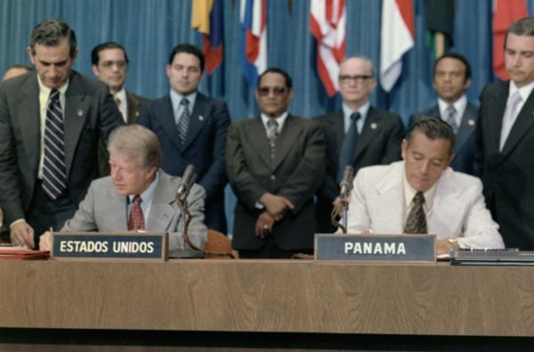 Jimmy Carter and Omar Torrijos signing the Panama Canal Treaty.