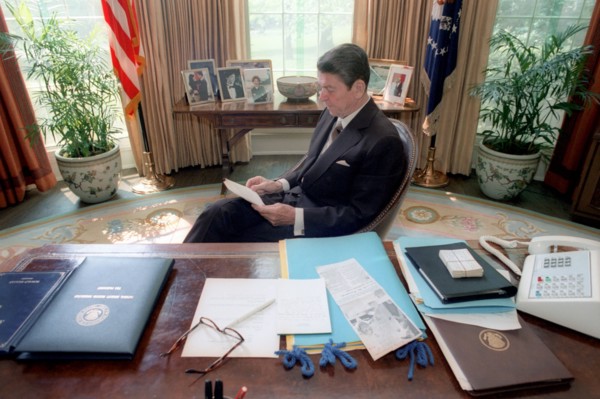 President Reagan reading.