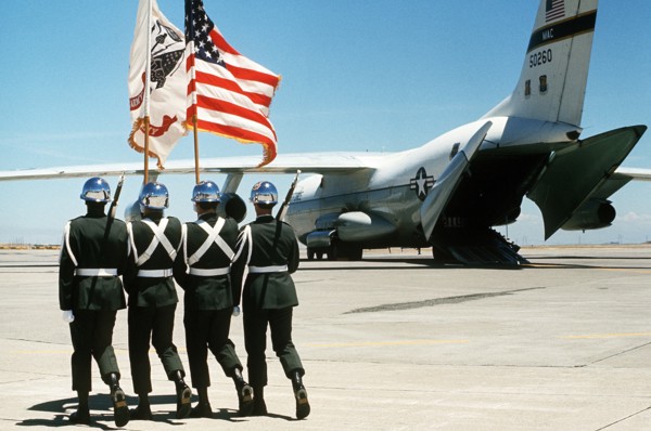 1977 - An Army color guard marches out