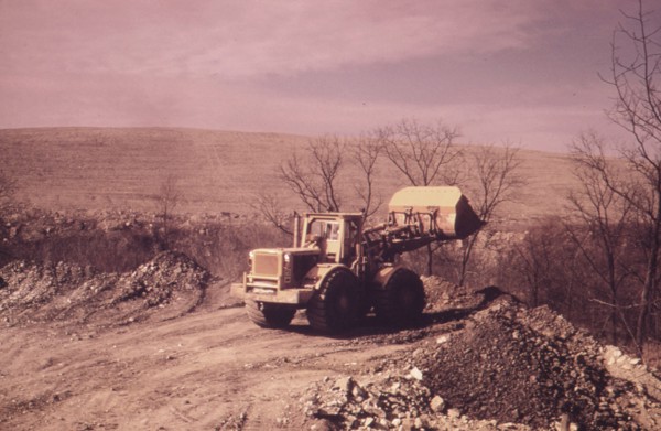 A Bulldozer Prepares A Path for One of the Huge Coal Shovels