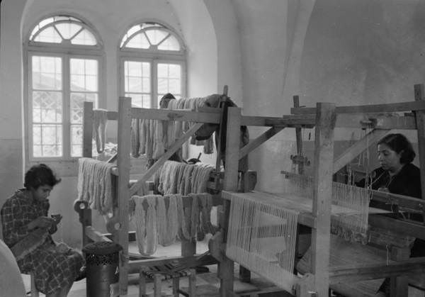 Women's Institute, Jerusalem. One of the weaving rooms, women working on looms ca. between 1934 and 1939