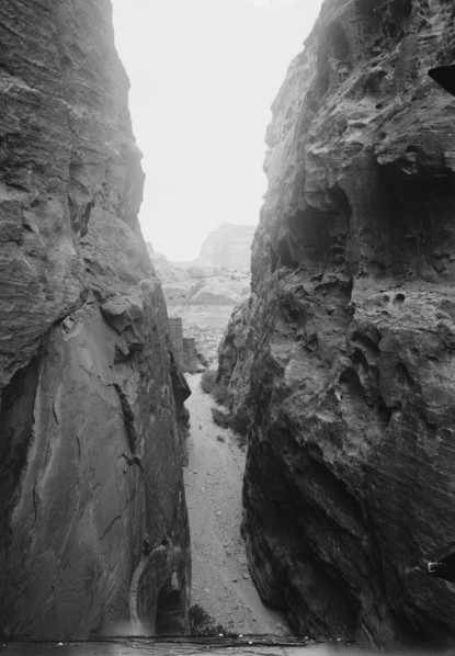 Petra in Transjordan. Sik between el-Khazne and the theatre ca. 1900