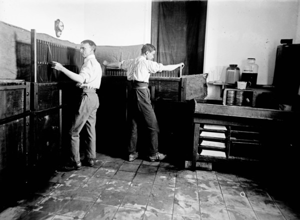 Workers developing film at the American Colony photo department ca. between 1898 and 1930