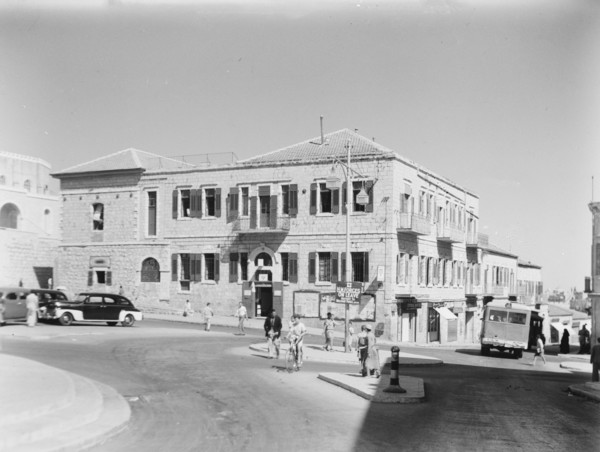 YMCA Hostel, old post office building, pedestrians and auto traffic in Jerusalem ca. between 1920 and 1946