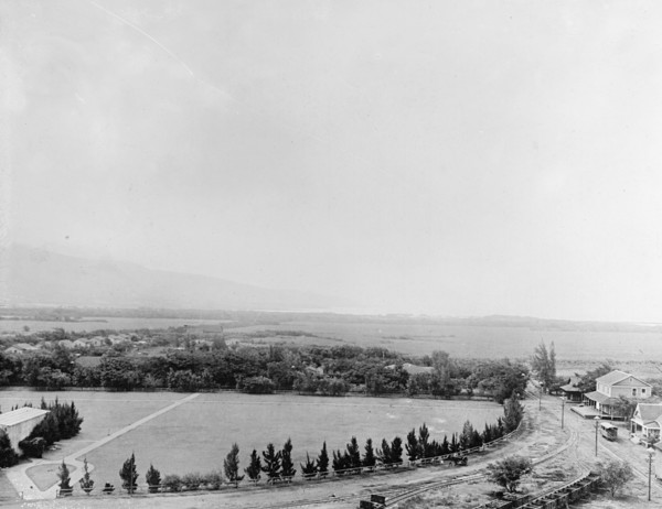 Sugar plantation in Hawaii. Showing shipping port in distance ca.  between 1910 and 1920
