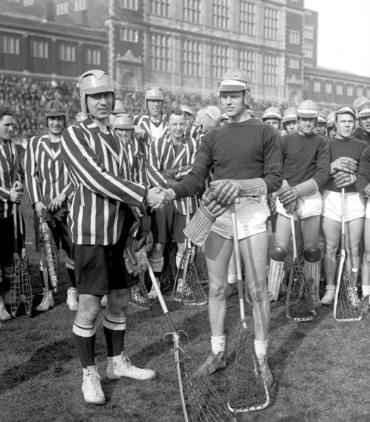 Rival men's lacrosse players shaking hands ca. between 1909 and 1923