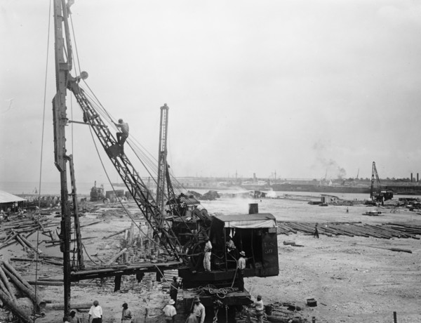 Panama Canal. Men working at the Cristobal leveling station ca. between 1909 and 1919