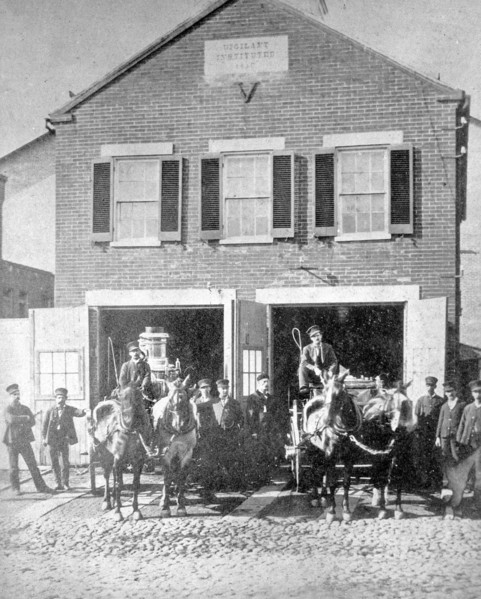 Fire house with horse drawn engines, Washington., D.C. ca. between 1909 and 1940