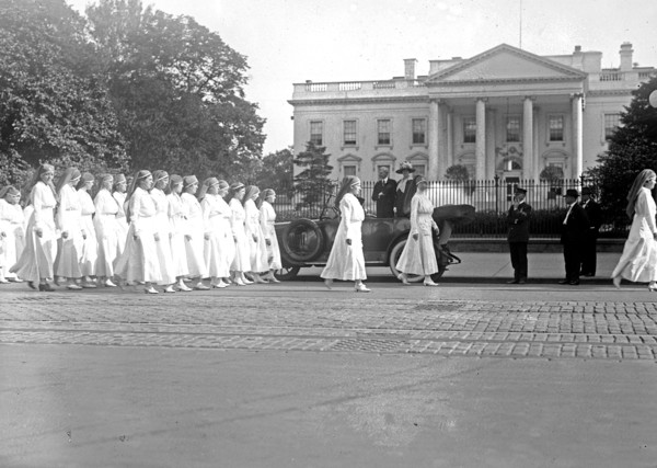 Red Cross parade, marching past White House, [Washington, D.C.] ca.  May 1918
